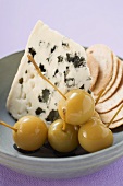 Blue cheese with pickled cherries and crackers