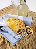 Cornish pasty on picnic basket (England)