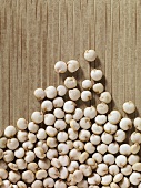 Quinoa on wooden background