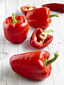 Red peppers, whole and halved