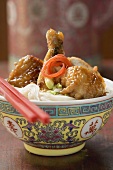 Chicken leg on rice noodles (Asia)