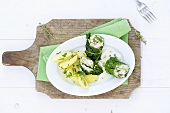 Savoy cabbage leaves stuffed with redfish, parsley potatoes
