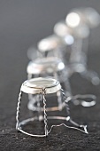 Wire fasteners from sparkling wine bottles