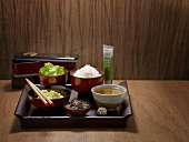 A tray of various Japanese dishes