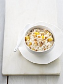 Sweet peach risotto with almonds