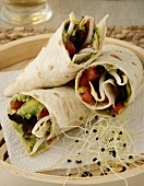 Wrap filled with vegetables, beansprouts and guacamole