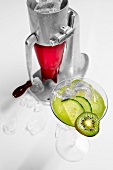 Kiwi Cumber (cocktail with vodka, kiwi and cucumber) and an ice crusher