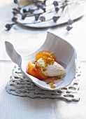 Vanilla ice cream with candied peaches