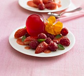 Berry salad with egg-shaped jelly