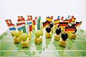 Cheese on cocktail sticks with various flags
