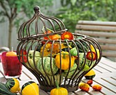 Ornamental gourds, Chinese lanterns & straw flowers in basket