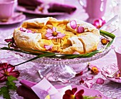 Pear tart decorated with flowers