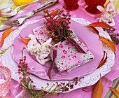 Place setting decorated with heather and china angel