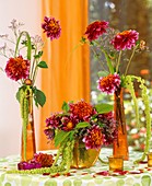 Dahlias, sea lavender and Amaranthus in glass vases