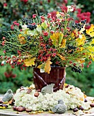 Arrangement of spindle and privet berries & autumn leaves