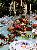 Festive table decoration: garland, clematis seed heads, Parthenocissus