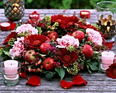 Table wreath of Gerbera, carnations and apples