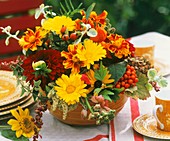Arrangement of marigolds, Tagetes and dahlias