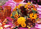 Autumn wreath of dahlias, Tagetes and marigolds