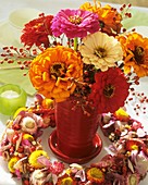 Zinnias with rose hips & wreath of straw flowers & hydrangeas