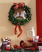 Box wreath with small wooden rocking horse