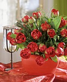 Vase of red tulips