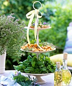 Herbs, open sandwiches & cheese savouries on tiered stand