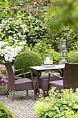 Garden furniture in summery garden