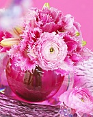 Pink spring arrangement of tulips and ranunculus