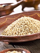 Barley grains in terracotta dish
