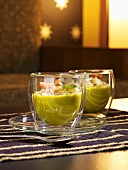 Guacamole with crab salad in two glasses