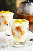 Mascarpone cream with clementines in glass cups for breakfast