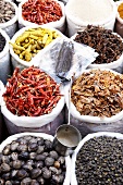 Various spices in sacks at a market