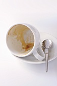 Empty coffee cup (with dregs)