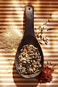 Rice mixture on wooden spoon