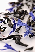 Tea leaves and dried flowers (close-up)