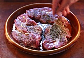 Seasoning marinated chuck steaks