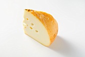 A piece of semi-firm cheese