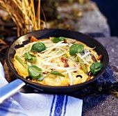 Frittata with smoked wild boar ham and basil