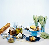 Laid table with various types of cheese