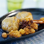 Cheese-filled pastries, with cloudberries