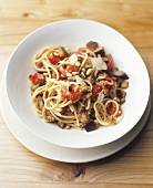 Spaghetti with cherry tomatoes, aubergines and pine nuts