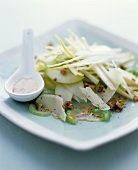 Apple and celery salad with walnuts and Parmesan