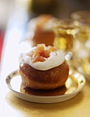 Savarin with cream and candied fruit