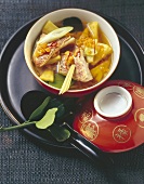 Fish soup with saffron, pineapple and red lentils