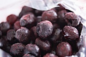 Frozen cherries in freezer bag (close-up)