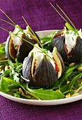 Stuffed figs on rocket salad