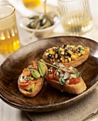 Variazione di crostini (Toasted bread with various toppings)