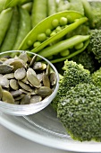 Blanched vegetables and pumpkin seeds