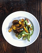 Roasted pumpkin with rocket, pecans and maple dressing
